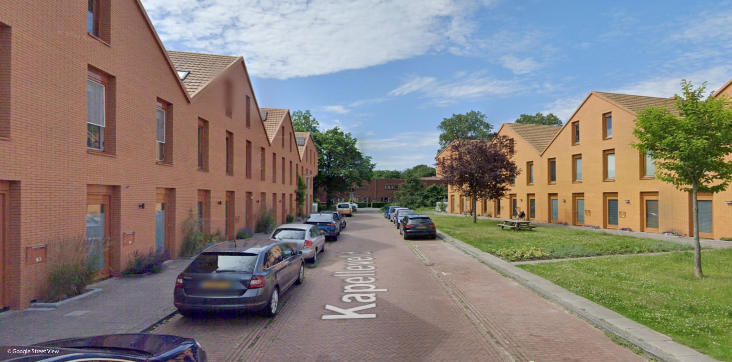 Residential street with rowhouses (before)